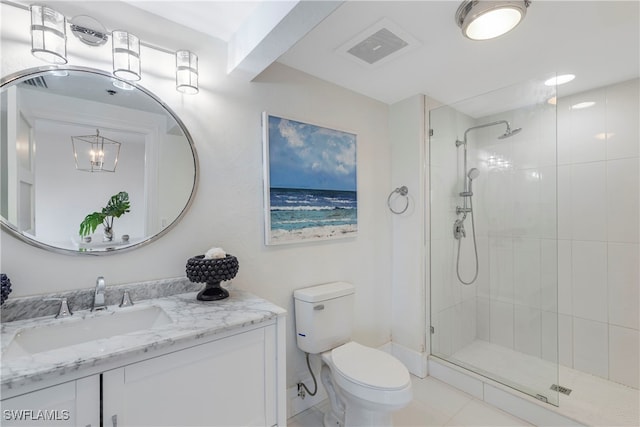 bathroom featuring visible vents, a shower stall, toilet, and vanity