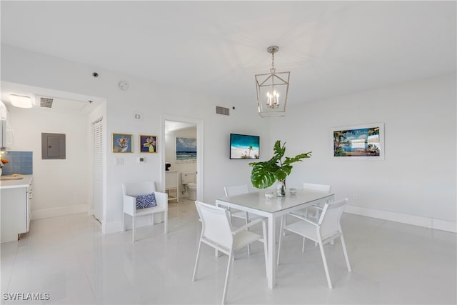 dining space featuring electric panel, baseboards, and visible vents