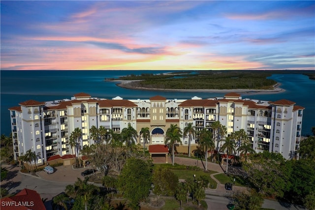 view of building exterior featuring a water view