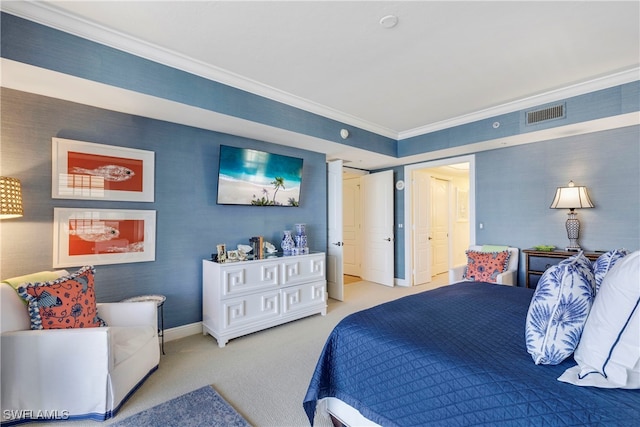 bedroom featuring baseboards, visible vents, carpet floors, and ornamental molding