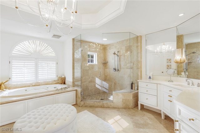 full bathroom featuring vanity, visible vents, an inviting chandelier, a stall shower, and a bath