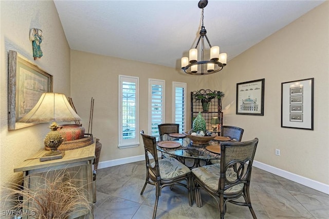 dining area featuring a chandelier