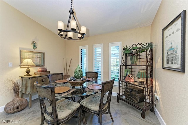 dining room with a chandelier