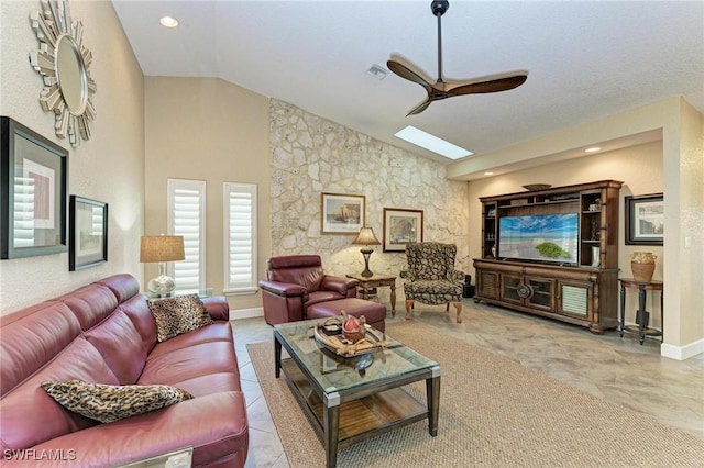 tiled living room featuring ceiling fan