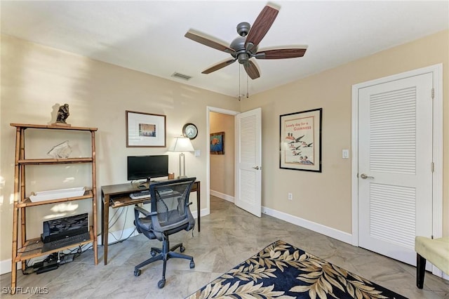 home office with ceiling fan