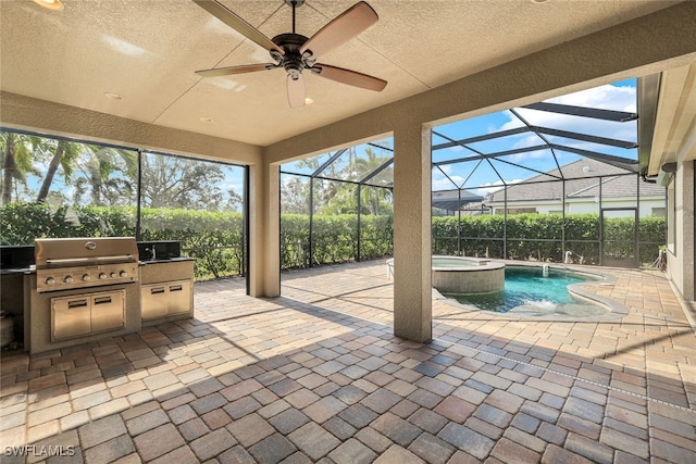 view of patio / terrace featuring glass enclosure, area for grilling, and ceiling fan