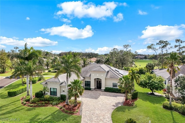 view of front of home with a front yard