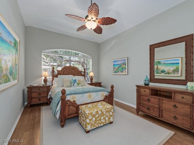 bedroom featuring ceiling fan and light wood-type flooring