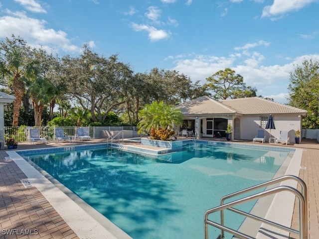 view of pool featuring a patio