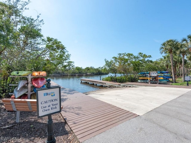 dock area featuring a water view