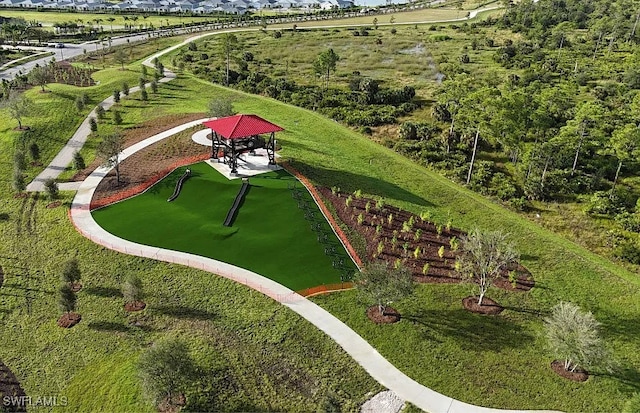 birds eye view of property with a rural view