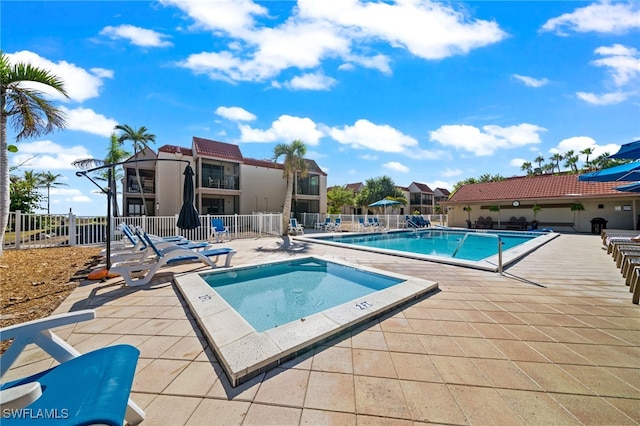 view of swimming pool featuring a patio