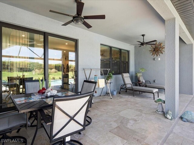 view of patio with ceiling fan