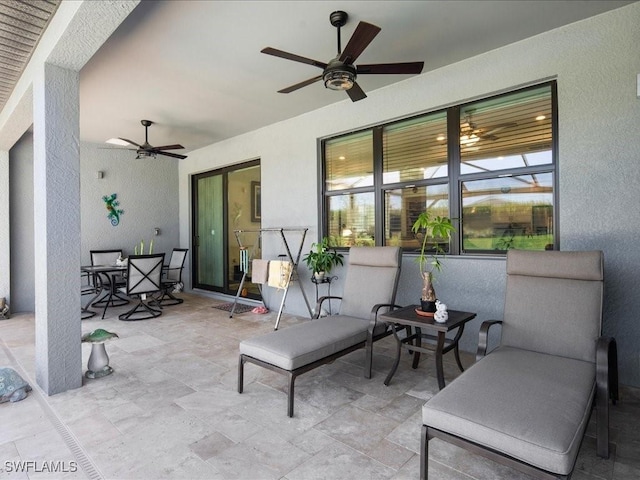 view of patio with ceiling fan