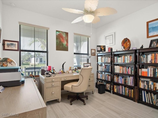 office area with ceiling fan