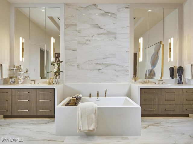 bathroom featuring vanity and a bathing tub