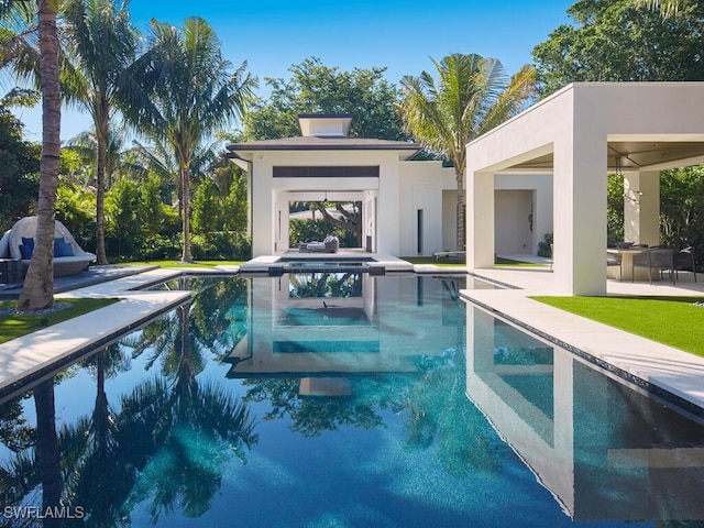 view of swimming pool featuring a patio