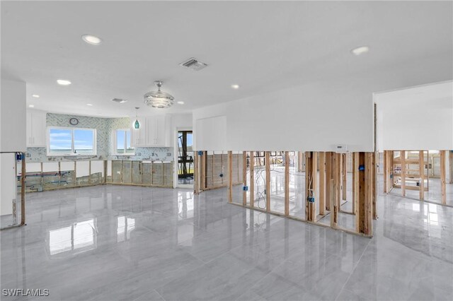 unfurnished room featuring ceiling fan