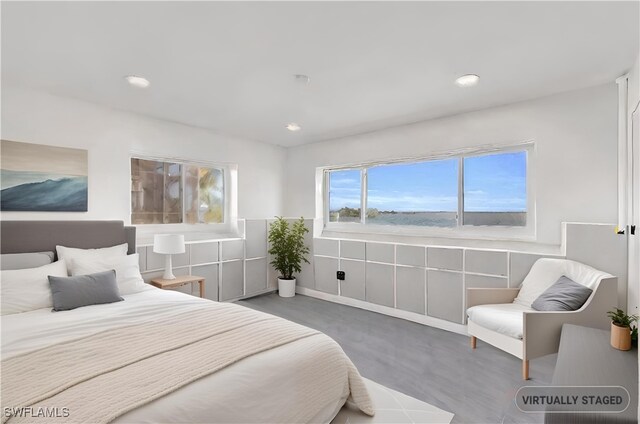 bedroom with concrete floors