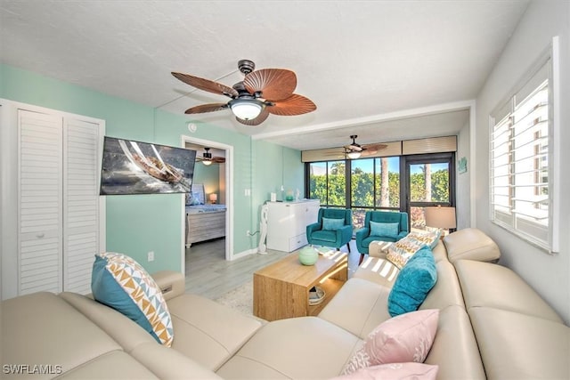 living room with light hardwood / wood-style flooring