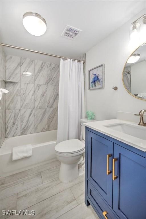 full bathroom featuring vanity, toilet, and shower / bath combo with shower curtain