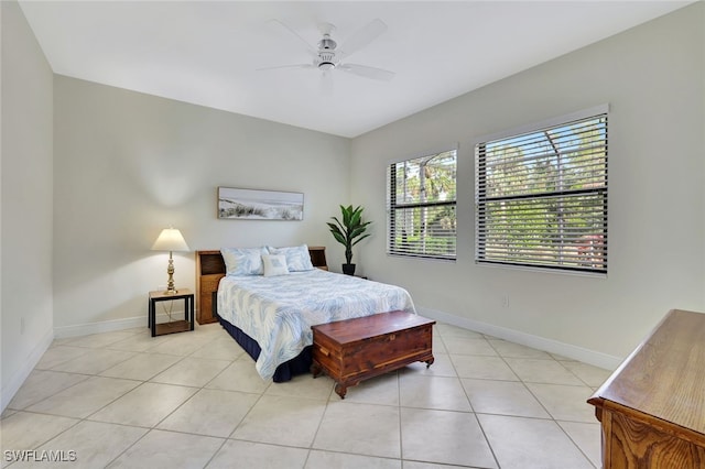 tiled bedroom with ceiling fan