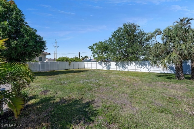 view of yard with fence