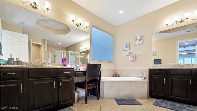 full bathroom with tile patterned floors, two vanities, visible vents, a stall shower, and a bath