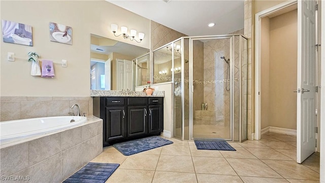 full bathroom with vanity, a shower stall, a bath, and tile patterned floors