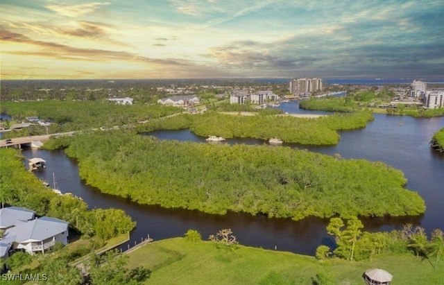 3240 Banyon Hollow Loop, North Fort Myers, FL 33903 - aerial view at dusk of a water view