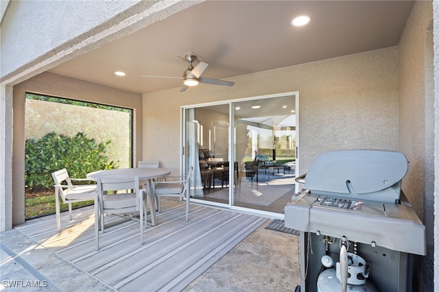 view of patio / terrace with grilling area and ceiling fan