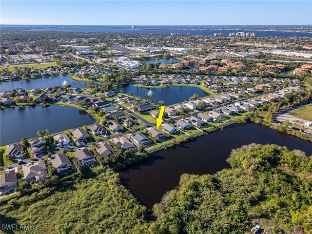 drone / aerial view with a water view