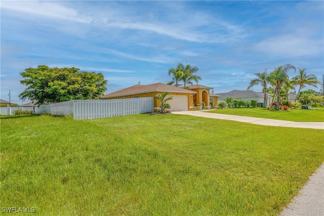 1427 SW 2nd St, Cape Coral, FL 33991 - view of front facade with driveway, an attached garage, and stucco siding