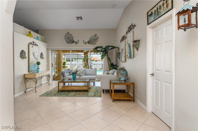 tiled living room with vaulted ceiling