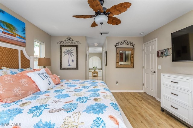 bedroom featuring ceiling fan and light hardwood / wood-style flooring