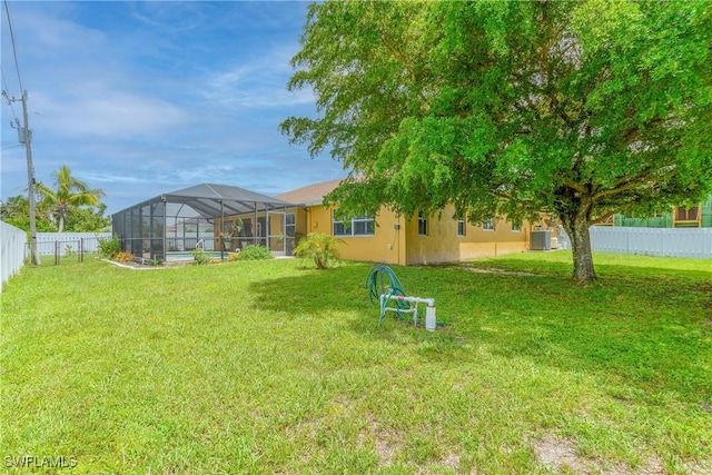 1427 SW 2nd St, Cape Coral, FL 33991 - fenced backyard featuring glass enclosure