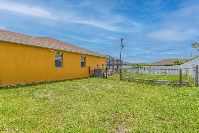 view of yard featuring a lanai