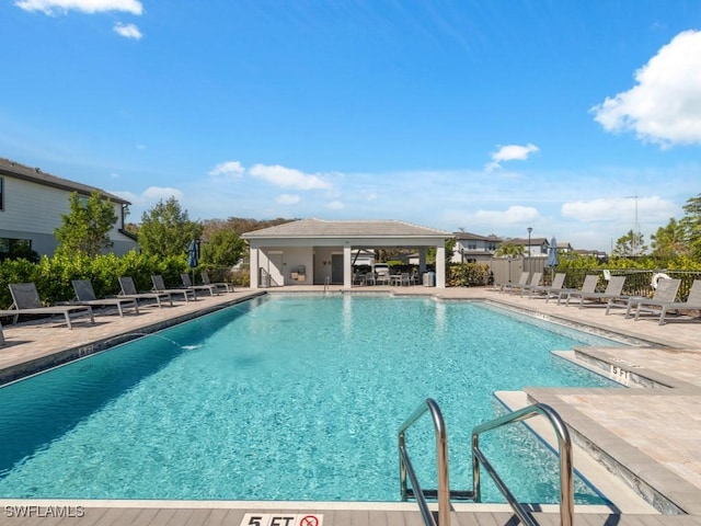 view of pool featuring a patio