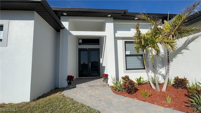 entrance to property with french doors