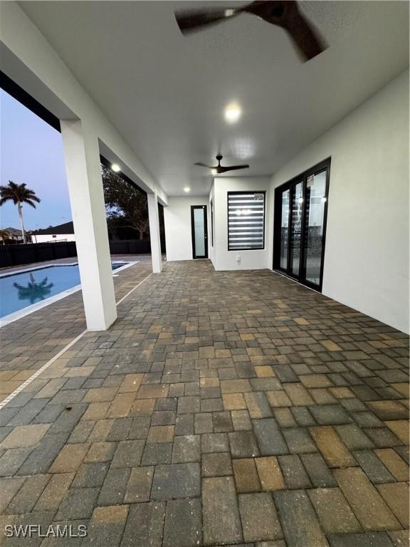 view of patio / terrace featuring ceiling fan