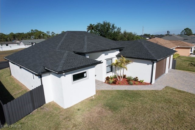 view of property exterior with a yard