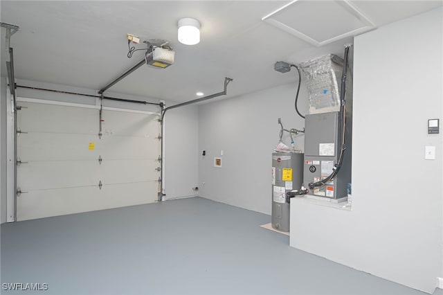 garage with a garage door opener and water heater