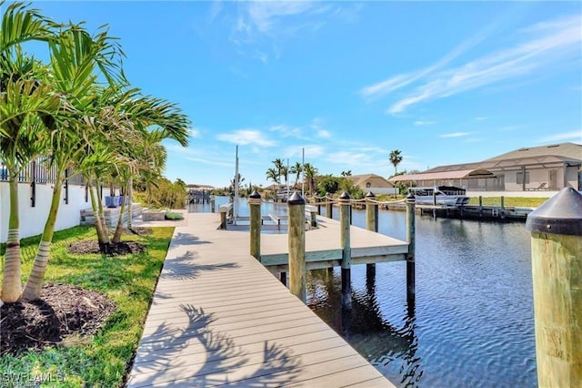 view of dock with a water view