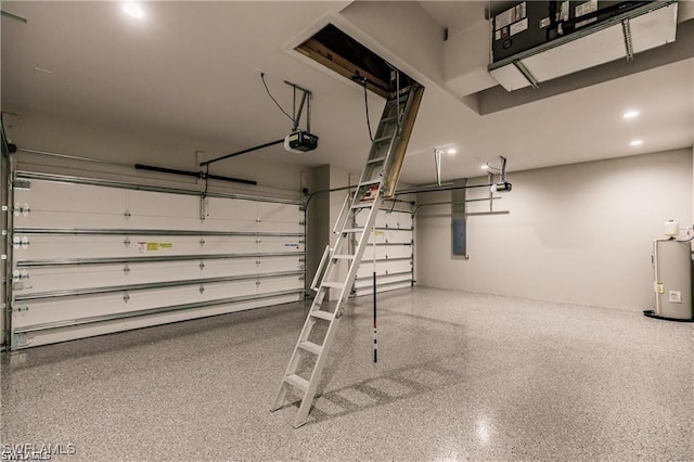 garage featuring electric panel, electric water heater, and a garage door opener