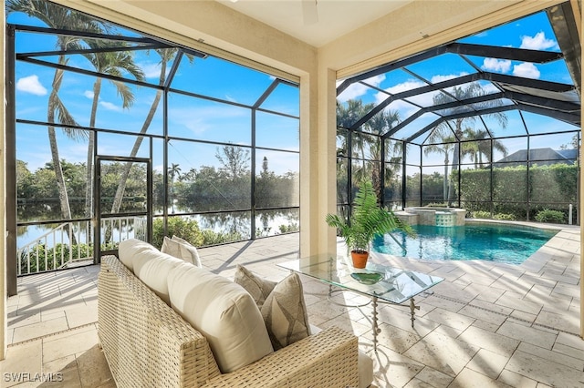 view of pool with a water view