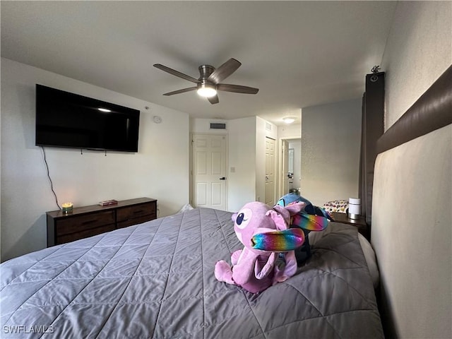 bedroom featuring ceiling fan