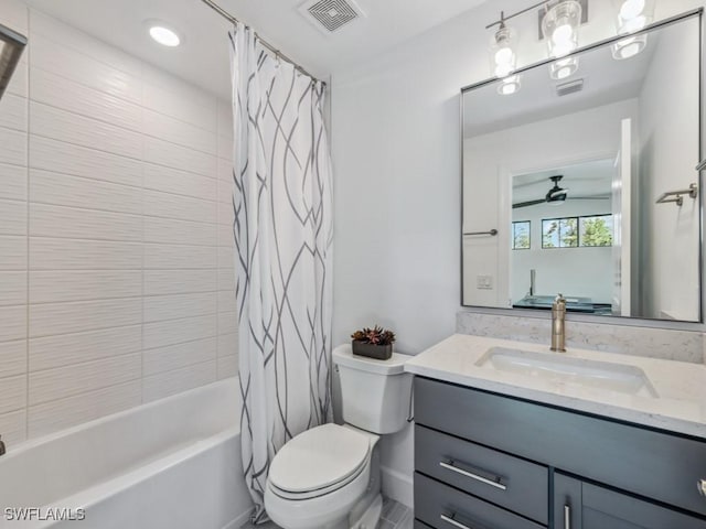 full bathroom featuring ceiling fan, toilet, vanity, and shower / tub combo with curtain