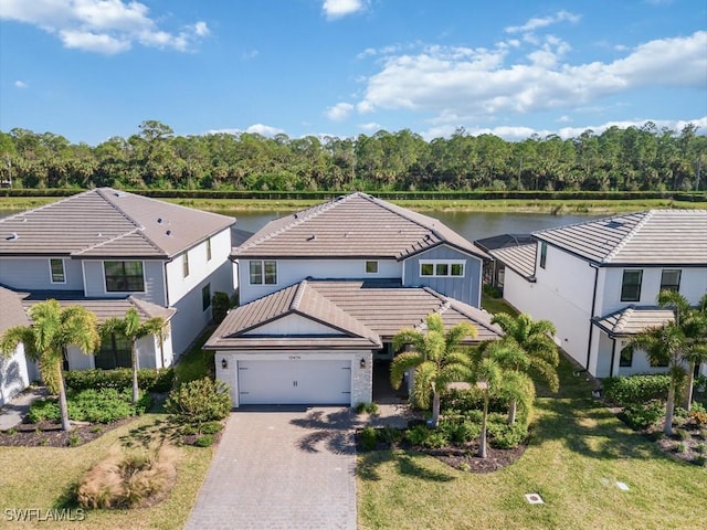 drone / aerial view with a water view