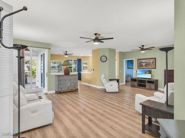 living room with light hardwood / wood-style flooring