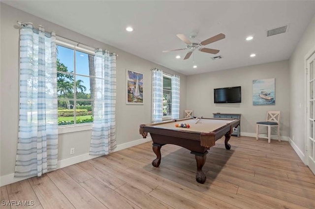 recreation room featuring light hardwood / wood-style flooring, a healthy amount of sunlight, and billiards